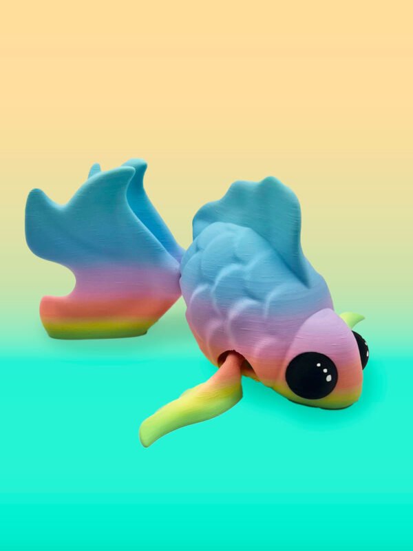 Colorful, artistic fish sculpture on gradient background.